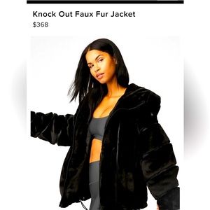 Alo yoga never been worn women’s Knock Out faux fur jacket with hood in black